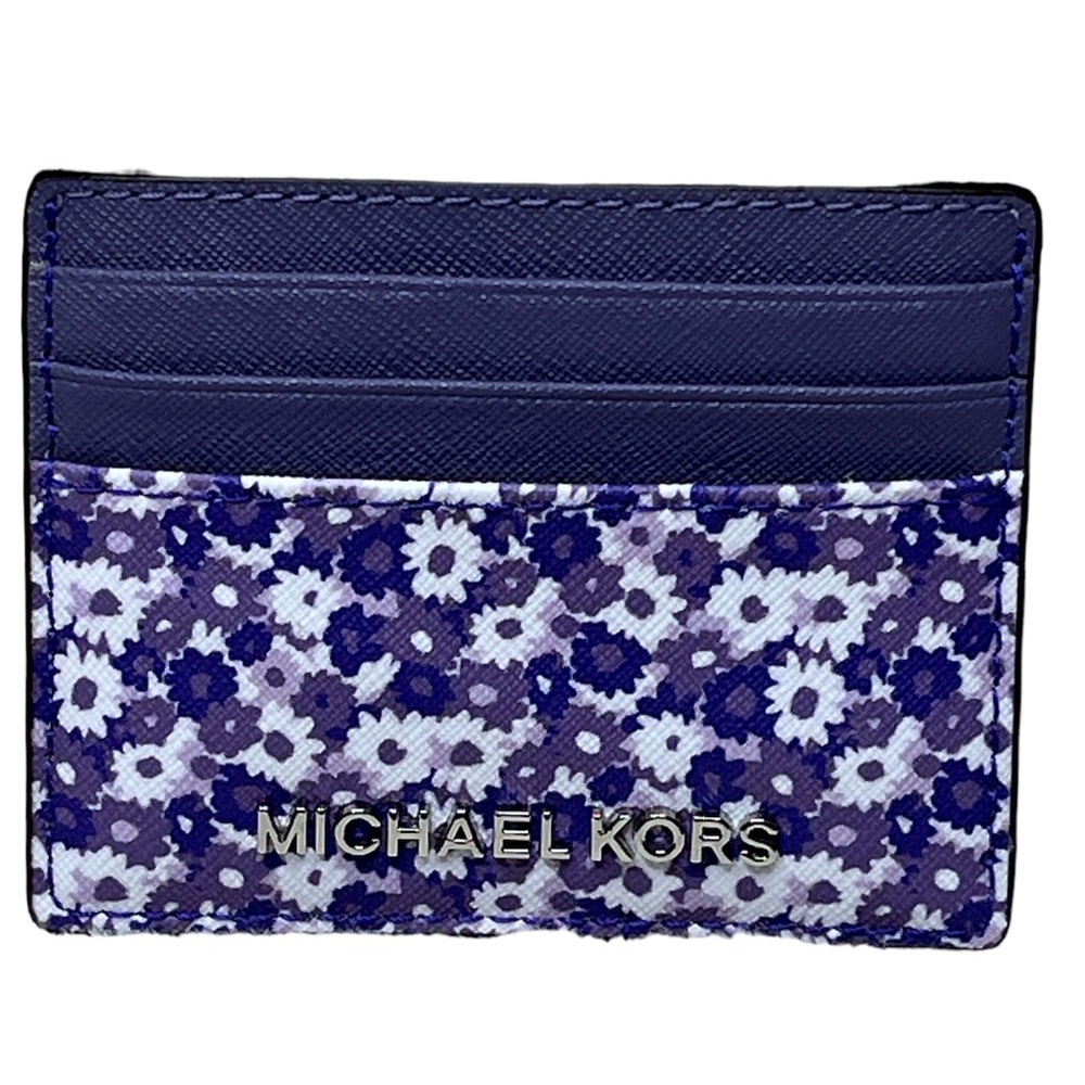 Michael Kors purple with white daisies leather card holder